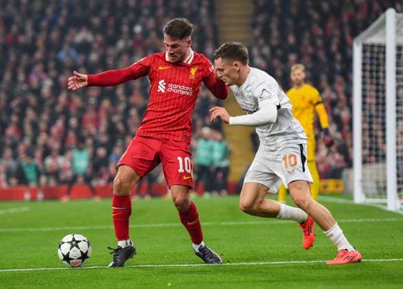 Liverpool v Bayer Leverkusen UEFA Champions League Alexis Mac Allister of Liverpool and Florian Wirtz of Bayern Leverkusen during the UEFA Champions League match at Anfield, Liverpool UK Newspapers OUT Copyright: xKarlxVallantinex FIL-20882-0068