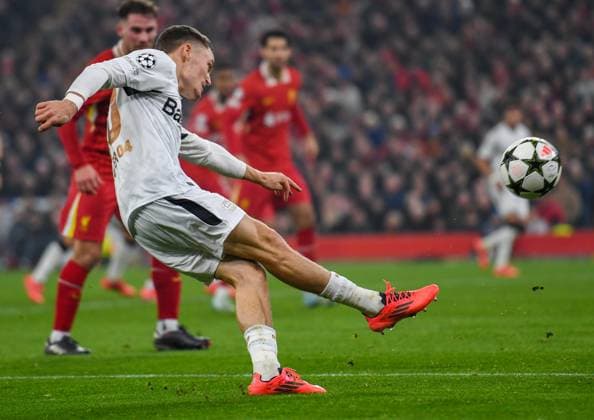 Liverpool v Bayer Leverkusen UEFA Champions League Florian Wirtz of Bayern Leverkusen gets a shot at goal during the UEFA Champions League match at Anfield, Liverpool UK Newspapers OUT Copyright: xKarlxVallantinex FIL-20882-0069
