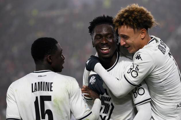 Lamine Camara, Soungoutou Magassa and Eliesse Ben Seghir of AS Monaco FC celebrate after Thilo Kehrer (not pictured) scored the goal of 0-1 during the Champions League football match between Bologna FC and AS Monaco FC at Renato Dall Ara stadium in Bologna (Italy), November 5, 2024. andreaxstaccioli