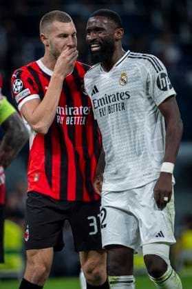 Real Madrid C.F. v AC Mailand - UEFA Champions League 2024 25 League Phase MD3 Strahinja Pavlovic of AC Milan (L) argues with Antonio Rudiger of Real Madrid CF (R) during the UEFA Champions League 2024 25 League Phase MD4 match between Real Madrid C.F. and AC Milan at Estadio Santiago Bernabeu on November 5, 2024 in Madrid, Spain. Madrid Estadio Santiago Bernabeu Madrid Spain Copyright: xAlbertoxGardinx AGardin_20241105_Football_Champions_Real_Madrid_Milan_818