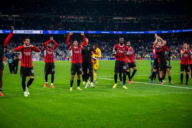 Real Madrid C.F. v AC Mailand - UEFA Champions League 2024 25 League Phase MD3 Players of AC Milan (from L to R) Theo Hernandez, Emerson Royal, Tijjani Reijnders, Tammy Abraham seen celebrates the victory during the UEFA Champions League 2024 25 League Phase MD4 match between Real Madrid C.F. and AC Milan at Estadio Santiago Bernabeu on November 5, 2024 in Madrid, Spain. Madrid Estadio Santiago Bernabeu Madrid Spain Copyright: xAlbertoxGardinx AGardin_20241105_Football_Champions_Real_Madrid_Milan_820