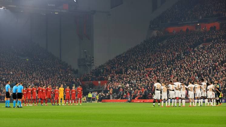 5th November 2024; Anfield, Liverpool, Merseyside, England; Champions League Football, Liverpool versus Bayer Leverkusen; Liverpool and Bayer Leverkusen players line up for a minutes& x2019; silence in tribute for the victims of the recent floods in Valencia  ActionPlus12712527 DavidxBlunsden