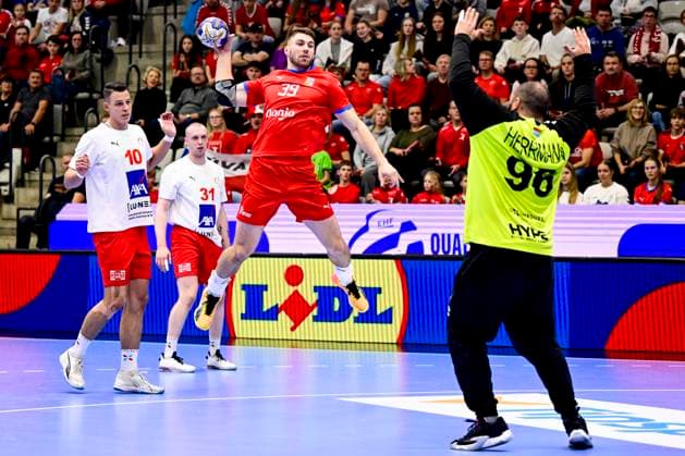 From left (front) Czech Lukas Morkovsky, Mika Herrmann, goalie of Luxembourg in action during the European Handball Championship 2026 Group 5 match qualifier Czechia vs Luxembourg in Prague, Czech Republic, November 6, 2024. (CTKxPhoto OndrejxDeml) CTKPhotoP2024110610506  CTKPhotoP2024110610506