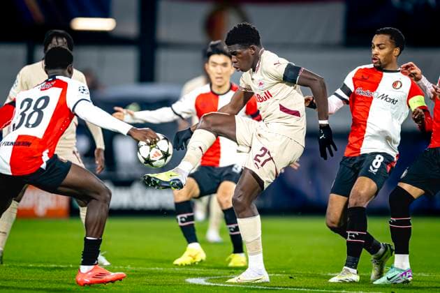 Red Bull Salzburg midfielder Lucas Gourna-Douath, Feyenoord Rotterdam midfielder Quinten Timber, during the match Feyenoord - Salzburg at the Feyenoord stadium De Kuip for the UEFA Champions League - League phase - Matchday 4 season 2024-2025 in ROTTERDAM, Netherlands on 6 november 2024, (photo by Marcel van Dorst EYE4images DeFodi Images) not used in POL SRB CRO FRA GBR NED ITA USA Defodi-746_198367