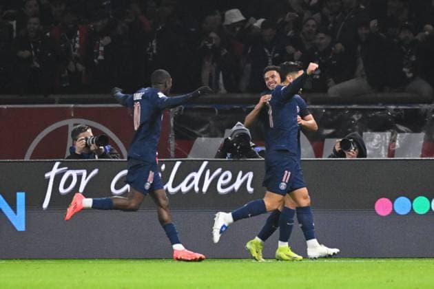 Warren ZAIRE EMERY ( 33 - PSG ) celebrates with teammates during the UEFA Champions League match between Paris Saint Germain and Atletico de Madrid at Parc Des Princes on November 06, 2024 in Paris, France. ( Photo by federico pestellini panoramic ) - FOOTBALL : PSG vs Atletico de Madrid - Ligue des Champions - 06 11 2024 FedericoPestellini Panoramic 