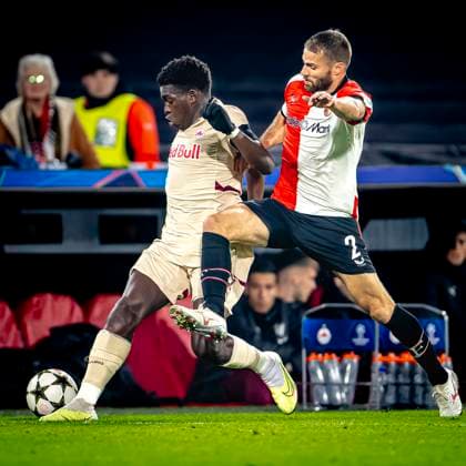 Red Bull Salzburg midfielder Lucas Gourna-Douath, Feyenoord Rotterdam defender Bart Nieuwkoop, during the match Feyenoord - Salzburg at the Feyenoord stadium De Kuip for the UEFA Champions League - League phase - Matchday 4 season 2024-2025 in ROTTERDAM, Netherlands on 6 november 2024, (photo by Marcel van Dorst EYE4images DeFodi Images) not used in POL SRB CRO FRA GBR NED ITA USA Defodi-746_198382