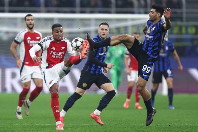 Sport Bilder des Tages Gabriel of Arsenal battles with Mehdi Taremi of Inter Milan Inter Milan v Arsenal, UEFA Champions League, Group Stage, Football, San Siro Stadium, Milan, Italy - 06 Nov 2024 EDITORIAL USE ONLY No use with unauthorised audio, video, data, fixture lists, club league logos or live services. Online in-match use limited to 120 images, no video emulation. No use in betting, games or single club league player publications.  Copyright: xMarcoxCanienero Shutterstockx 14863816y