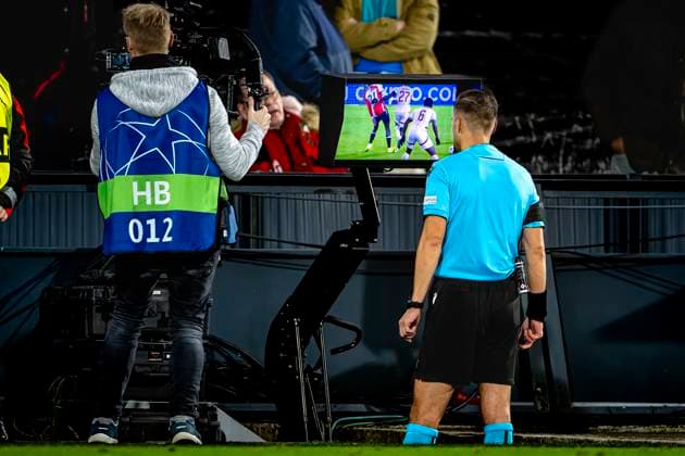 Referee Aleksandr Radius checks VAR, during the match Feyenoord - Salzburg at the Feyenoord stadium De Kuip for the UEFA Champions League - League phase - Matchday 4 season 2024-2025 in ROTTERDAM, Netherlands on 6 november 2024, (photo by Marcel van Dorst EYE4images DeFodi Images) not used in POL SRB CRO FRA GBR NED ITA USA Defodi-746_198514