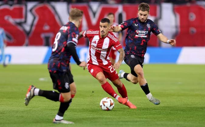 Chiquinho of Olympiakos and Nicolas Raskin of Rangers Olympiakos v Rangers, UEFA Europa League, Group Stage, Football, Georgios Karaiskakis Stadium, Pireas, Greece - 07 Nov 2024 EDITORIAL USE ONLY No use with unauthorised audio, video, data, fixture lists, club league logos or live services. Online in-match use limited to 120 images, no video emulation. No use in betting, games or single club league player publications. Copyright: xCostasxBaltas Shutterstockx 14878028p