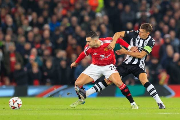 Manchester United, ManU v PAOK Salonica Europa League 07 11 2024. Stefan Schwab (22) of PAOK Salonika challenges Diogo Dalot (20) of Manchester United during the Europa League match between Manchester United and PAOK Salonica at Old Trafford, Manchester, England on 7 November 2024. Manchester Old Trafford Greater Manchester England Editorial use only , Copyright: xConorxMolloyx PSI-20778-0025