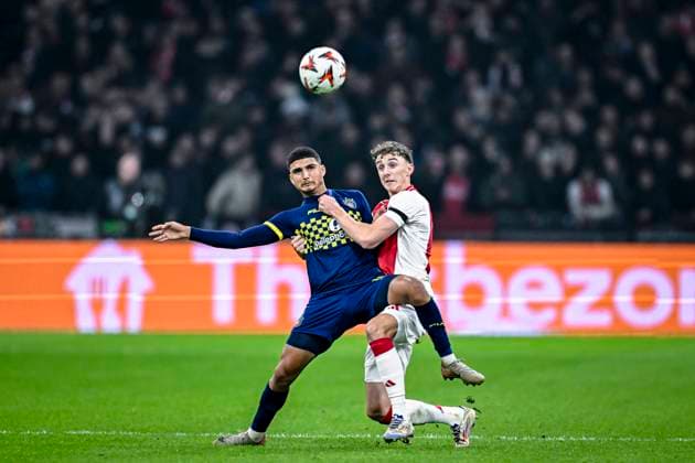 Maccabi Tel Aviv midfielder Elad Madmon, AFC Ajax Amsterdam defender Youri Baas, during the match Ajax - Maccabi Tel Aviv at the Johan Cruijff ArenA for the UEFA Europa League - League phase - Matchday 4 season 2024-2025 in AMSTERDAM, Netherlands on 7 november 2024, (photo by Stefan Koops EYE4images DeFodi Images) not used in POL SRB CRO FRA GBR NED ITA USA Defodi-746_198906