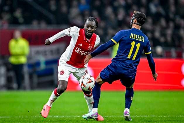AFC Ajax Amsterdam forwarder Bertrand Traore, Maccabi Tel Aviv midfielder Sagiv Jehezkel, during the match Ajax - Maccabi Tel Aviv at the Johan Cruijff ArenA for the UEFA Europa League - League phase - Matchday 4 season 2024-2025 in AMSTERDAM, Netherlands on 7 november 2024, (photo by Stefan Koops EYE4images DeFodi Images) not used in POL SRB CRO FRA GBR NED ITA USA Defodi-746_198914