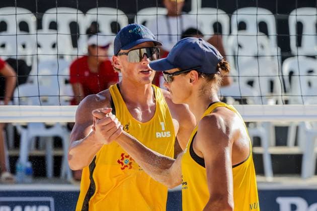 (241109) -- LAGUNA PROVINCE, Nov. 9, 2024 -- D Artagnan Potts (L) and Jack Pearse of Australia celebrate after scoring a point during the men s semifinal match between Wu Jiaxin Halikejiang of China and D Artagnan Potts Jack Pearse of Australia at the Asian Volleyball Confederation (AVC) 2024 Asian Senior Beach volleyball, Beachvolleyball Championships in Laguna Province, the Philippines, Nov. 9, 2024. ) (SP)PHILIPPINES-LAGUNA PROVINCE-AVC 2024 ASIAN SENIOR BEACH VOLLEYBALL CHAMPIONSHIPS-SEMIFINALS RouellexUmali 