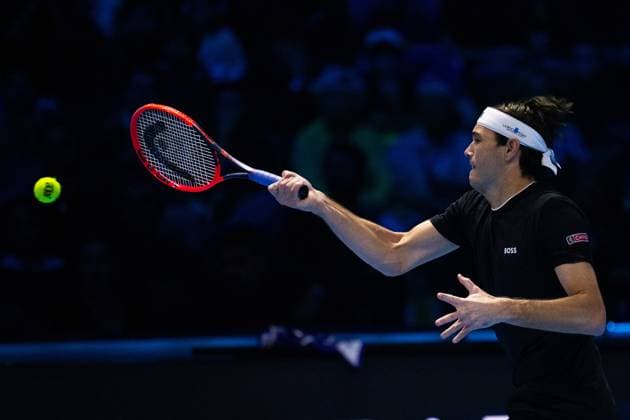 Taylor Fritz, of United States returns the ball to Daniil Medvedev during& xa0;their singles tennis match of the ATP, Tennis Herren World Tour Finals at the Pala Alpitour, in Turin, Italy - - Sunday, November 10, 2024.  Copyright: xMarcoxAlpozzi LaPressex