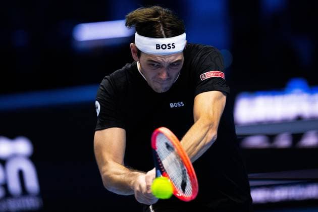 Taylor Fritz, of United States returns the ball to Daniil Medvedev during& xa0;their singles tennis match of the ATP, Tennis Herren World Tour Finals at the Pala Alpitour, in Turin, Italy - - Sunday, November 10, 2024.  Copyright: xMarcoxAlpozzi LaPressex
