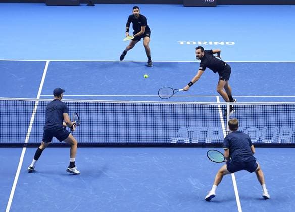 Sport Bilder des Tages November 11, 2024, Turin: Kevin Krawietz of German and Tim Puetz of german plays against Marcelo ArÃ valo of Salvador and Mate Pavi? of Croatia during the match of Nitto ATP, Tennis Herren Finals in Turin, 11 november 2024 ..The ATP men s double is preparing for the ATP Finals that will run from 10-17 November in Turin ANSA ALESSANDRO DI MARCO Nitto Atp Finals  - ZUMAa110 20241111_zaf_a110_001 Copyright: xAlessandroxDixMarcox