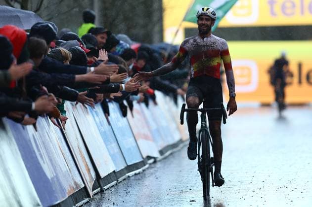 Second Spanish Felipe Orts Lloret celebrates as he crosses the finish line of the men s elite race at the Jaarmarktcross cyclocross cycling event in Niel, race 3 8 of the Superprestige competition, Monday 11 November 2024. DAVIDxPINTENS  x105184500x