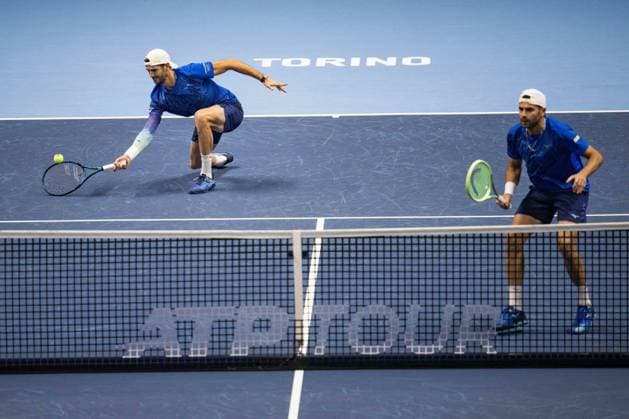 Italy s Andrea Vavassori returns the ball as Italy s Simone Bolelli looks on during the match against Rohan Bopanna, of India and Matthew Ebden of Australia, at the Inalpi Arena in Turin, Italy - - Monday, November 11, 2024.  Copyright: xMarcoxAlpozzi LaPressex