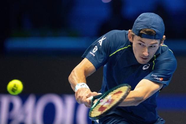 & xa0;Australia s Alex de Minaur returns the ball to Russia s Daniil Medvedev during& xa0;their singles tennis match of the ATP, Tennis Herren World Tour Finals at the Inalpi Arena, in Turin, Italy - - Tuesday, November 12, 2024.  Copyright: xMarcoxAlpozzi LaPressex