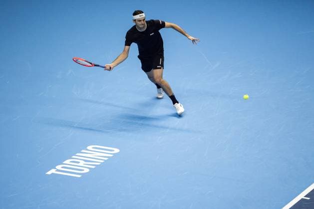 United States Taylor Fritz returns the ball to Australia s Alex de Minaur& xa0;during& xa0;their singles tennis match of the ATP, Tennis Herren World Tour Finals at the Inalpi Arena, in Turin, Italy - - Thursday, November 14, 2024.  Copyright: xMarcoxAlpozzi LaPressex