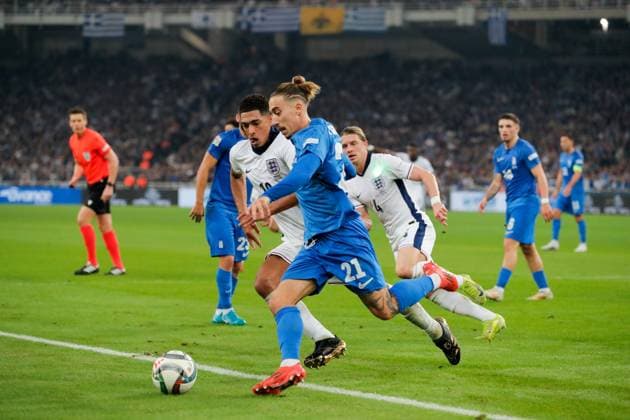 Greece v England UEFA Nations League Kostas Tsimikas of Greece and Jude Bellingham of England during the UEFA Nations League match at Olympic Stadium, Athens UK Newspapers OUT Copyright: xYannisxHalasx FIL-20915-0042