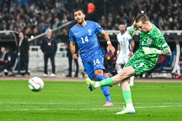 November 14, 2024, Athens, Athens, Greece: 14 VANGELIS PAVLIDIS of Greece competes with 1 JORDAN PICKFORD of England during the UEFA Nations League 2024 25 League B, Group B2 match between Greece and England on November 14, 2024 at OAKA Stadium, in Athens, Greece. Athens Greece - ZUMAk160 20241114_zip_k160_007 Copyright: xStefanosxKyriazisx