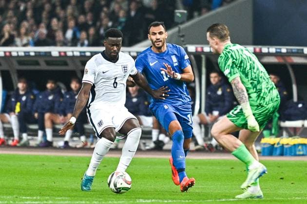 November 14, 2024, Athens, Athens, Greece: 6 MARC GUo°HI of England competes with 14 VANGELIS PAVLIDIS of Greece during the UEFA Nations League 2024 25 League B, Group B2 match between Greece and England on November 14, 2024 at OAKA Stadium, in Athens, Greece. Athens Greece - ZUMAk160 20241114_zip_k160_013 Copyright: xStefanosxKyriazisx