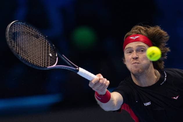 Russia s Andrey Rublev& xa0; returns the ball to Norway s Casper Ruud during& xa0;their singles tennis match of the ATP, Tennis Herren World Tour Finals at the Inalpi Arena, in Turin, Italy - - Friday, November 15, 2024.  Copyright: xMarcoxAlpozzi LaPressex