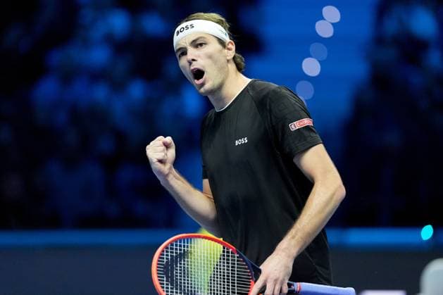 (241117) -- TURIN, Nov. 17, 2024 -- Taylor Fritz celebrates a point during the men s singles semifinal between Alexander Zverev of Germany and Taylor Fritz of the United States at the Nitto ATP, Tennis Herren Finals in Turin, Italy, Nov. 16, 2024. (SP)ITALY-TURIN-TENNIS-NITTO ATP FINALS-SEMIFINAL-ZVEREV VS FRITZ (Xinhua) 