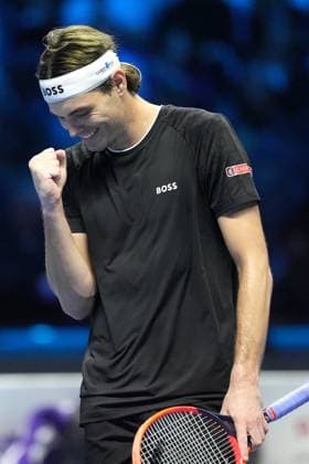 (241117) -- TURIN, Nov. 17, 2024 -- Taylor Fritz celebrates a point during the men s singles semifinal between Alexander Zverev of Germany and Taylor Fritz of the United States at the Nitto ATP, Tennis Herren Finals in Turin, Italy, Nov. 16, 2024. (SP)ITALY-TURIN-TENNIS-NITTO ATP FINALS-SEMIFINAL-ZVEREV VS FRITZ (Xinhua) 