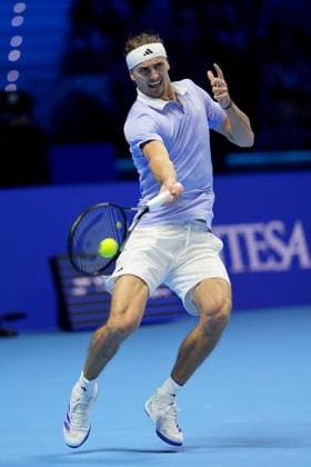 (241117) -- TURIN, Nov. 17, 2024 -- Alexander Zverev hits a return during the men s singles semifinal between Alexander Zverev of Germany and Taylor Fritz of the United States at the Nitto ATP, Tennis Herren Finals in Turin, Italy, Nov. 16, 2024. (SP)ITALY-TURIN-TENNIS-NITTO ATP FINALS-SEMIFINAL-ZVEREV VS FRITZ (Xinhua) 