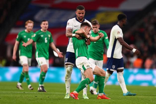17th November 2024; Wembley Stadium, London, England; Nations League, League B, Group 2 International Football, England versus Republic of Ireland; Jayson Molumby of Republic of Ireland tussles with Kyle Walker of England  ActionPlus12716739 ShaunxBrooks