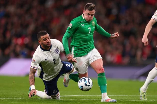 17th November 2024; Wembley Stadium, London, England; Nations League, League B, Group 2 International Football, England versus Republic of Ireland; Kyle Walker of England challenges Sammie Szmodics of Republic of Ireland and brings him down in the tackle  ActionPlus12716747 ShaunxBrooks