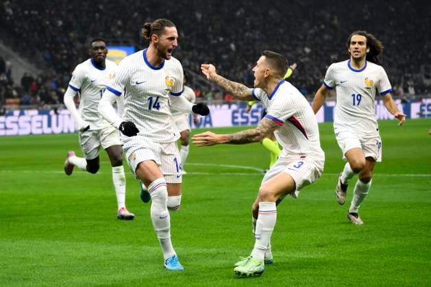 Adrien Rabiot of France celebrates with teammates after scoring the goal of 0-1 during the UEFA Nations League football match between Italy and France at San Siro stadium in Milano (Italy), November 17, 2024. AndreaxStaccioli
