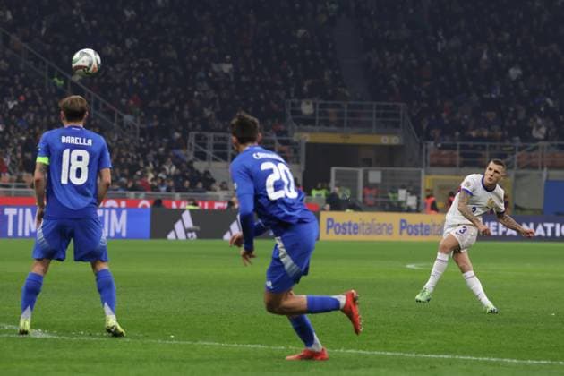 Milan, Italy, 17th November 2024. Lucas Digne of France scores a free kick to give the side a 2-0 lead during the UEFA Nations League match at Stadio Giuseppe Meazza, Milan. Picture credit should read: Jonathan Moscrop Sportimage EDITORIAL USE ONLY. No use with unauthorised audio, video, data, fixture lists, club league logos or live services. Online in-match use limited to 120 images, no video emulation. No use in betting, games or single club league player publications. SPI-3453-0011