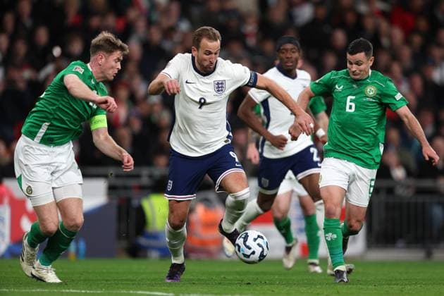 Harry Kane of England with (L) Nathan Collins of Republic of Ireland & Josh Cullen of Republic of Ireland (R) England v Rep. of Ireland - UEFA Nations League - League B - Group 2. Football. Wembey Stadium, London. UK. 17 NOV 2024 Editorial use only  Copyright: xJASONPIX Shutterstockx 14915934et