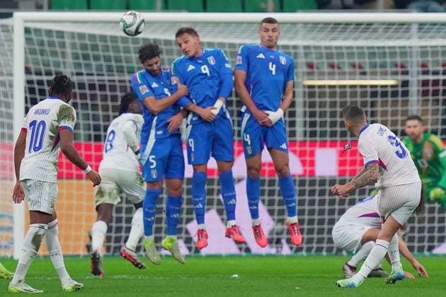 France s Lucas Digne scores 0-2 during the Uefa Nations League soccer match between Italy and France at the San Siro Stadium in Milan, north Italy - Sunday , November 17 , 2024. - Soccer .  Copyright: xSpada LaPressex