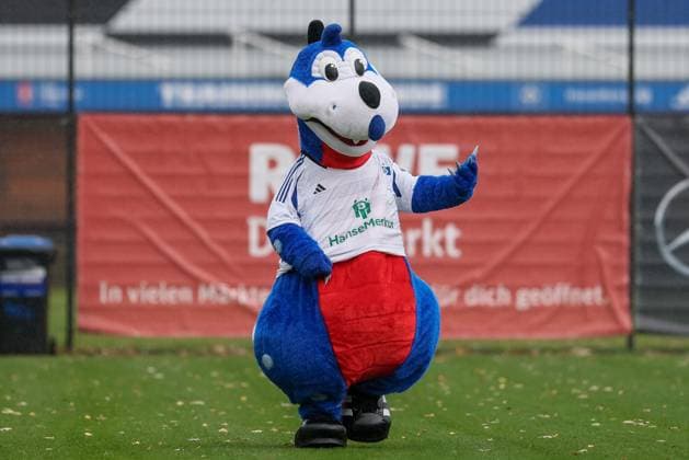 v.li.: Das HSV-Maskottchen Dino Hermann, Maskottchen des Hamburger SV, Freisteller, Einzelbild, Ganzkörper, Aktion, Action, DIE DFB-RICHTLINIEN UNTERSAGEN JEGLICHE NUTZUNG VON FOTOS ALS SEQUENZBILDER UND ODER VIDEOÄHNLICHE FOTOSTRECKEN. DFB REGULATIONS PROHIBIT ANY USE OF PHOTOGRAPHS AS IMAGE SEQUENCES AND OR QUASI-VIDEO., 17.11.2024, Hamburg (Deutschland), Fussball, 2. Frauen-Bundesliga, Hamburger SV - 1. FC Nürnberg