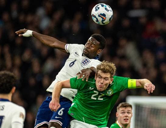 (241118) -- LONDON, Nov. 18, 2024 -- Marc Guehi (L) of England and Nathan Collins of Republic of Ireland head for the ball during the UEFA Nations League League B football match between England and the Republic of Ireland in London, England, on Nov. 17, 2024. (SP)BRITAIN-LONDON-FOOTBALL-NATIONS LEAGUE-ENGLAND VS REPUBLIC OF IRELAND LixYing 