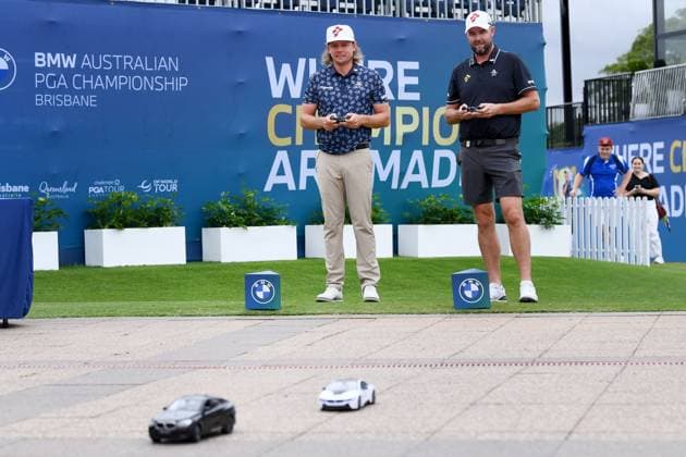 AUSTRALIAN PGA, Golf Herren GOLF PRACTICE, Australian golfers Cam Smith and Marc Leishman race model cars during an Australian PGA golf tournament practice session at the Royal Queensland Golf Club in Brisbane, Tuesday, November 19, 2024. ( NO ARCHIVING, EDITORIAL USE ONLY, NO USE IN BOOKS WITHOUT CONSENT BRISBANE QUEENSLAND AUSTRALIA  Copyright: xJONOxSEARLEx 20241119129299082188