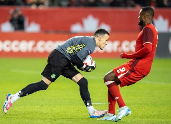November 19, 2024, Toronto, On, CANADA: Canada forward Cyle Larin challenges as Suriname keeper Etienne Vaessen makes a save in CONCACAF Nations League action in Toronto, Tuesday, Nov. 19, 2024. Canada News - November 19, 2024  - ZUMAc35_ 20241119_zaf_c35_137 Copyright: xFrankxGunnx