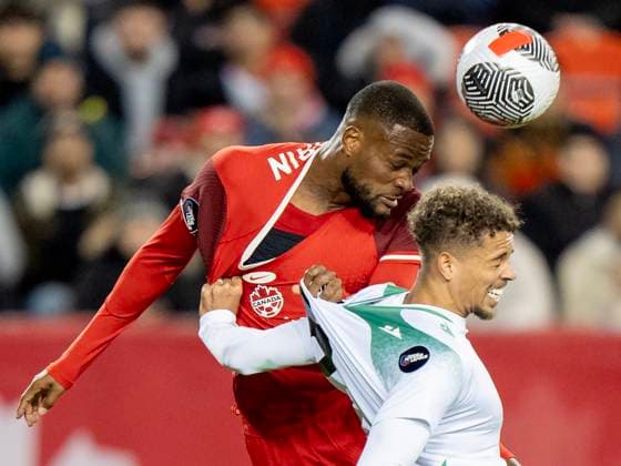 November 19, 2024, Toronto, On, CANADA: Canada forward Cyle Larin, left, and Suriname midfielder Justin Lonwijk battle for a header in CONCACAF Nations League action in Toronto, Tuesday, Nov. 19, 2024. Canada News - November 19, 2024 - ZUMAc35_ 20241119_zaf_c35_138 Copyright: xFrankxGunnx