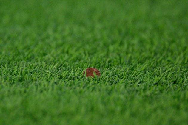 241121 A coin on the pitch during the Women s Champions League football match between Hammarby and Manchester City on November 21, 2024 in Stockholm. Photo: Simon Hastegard BILDBYRAN kod SH SH0547 fotboll football soccer fotball uefa womens champions league hammarby manchester city dam bbeng Copyright: SIMONxHASTEGARD BB241121SH032
