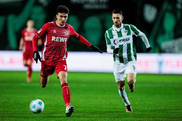 2. Fussball Bundesliga, Preußen Münster - 1. FC Köln; 22.11.2024 Zweikampf Dejan Ljubicic (1. FC Köln, 7), Charalambos Makridis (Preußen Münster, 14) 2. Fussball Bundesliga, Preußen Münster - 1. FC Köln, Münster, Preussenstadion am 22.11.2024 DFL REGULATIONS PROHIBIT ANY USE OF PHOTOGRAPHS AS IMAGE SEQUENCES AND OR QUASI-VIDEO.