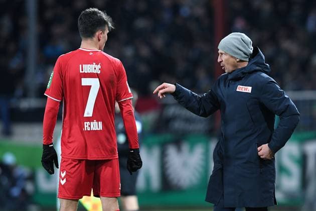 Fußball 2. Bundesliga 13. Spieltag SC Preußen Münster - 1. FC Köln am 22.11.2024 im Preußenstadion in Münster Dejan Ljubicic ( Köln ), links - Gerhard Struber ( Trainer Cheftrainer Köln ), rechts DFL regulations prohibit any use of photographs as image sequences and or quasi-video.