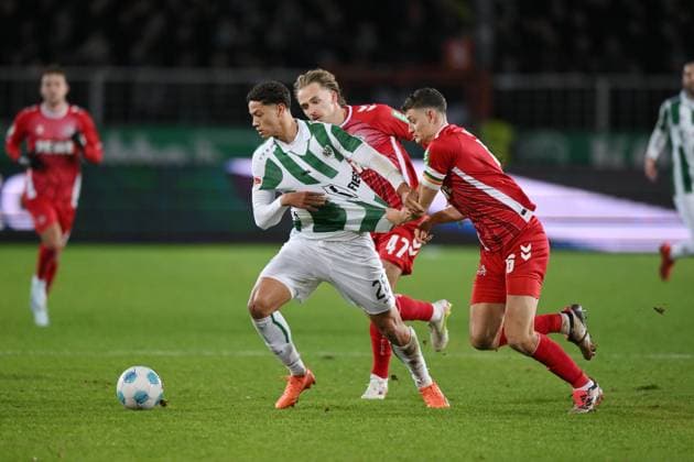 v.li., Andras Nemeth (Preußen Münster), Mathias Olesen (1.FC Koeln), Eric Martel (1.FC Koeln) 22.11.2024, Fussball 2. Bundesliga, 13. Spieltag, Saison 2024 2025 Preußen Münster - 1. FC Köln Muenster Preussenstadion Nordrhein Westfalen Deutschland