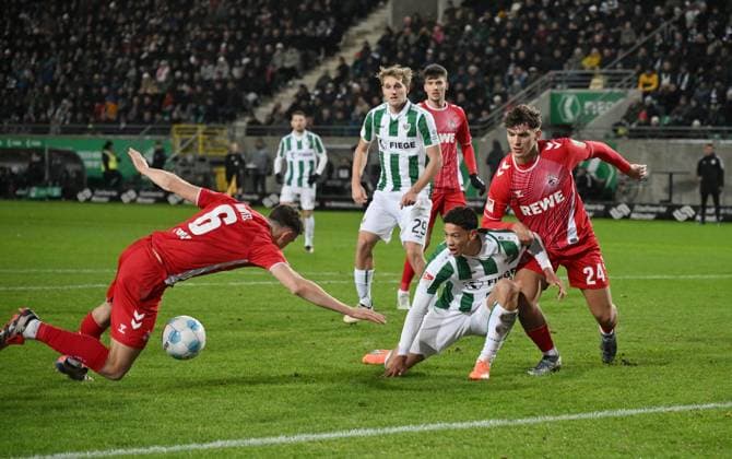 v.li., Eric Martel (1.FC Koeln), Andras Nemeth (Preußen Münster), Julian Pauli (1.FC Koeln) 22.11.2024, Fussball 2. Bundesliga, 13. Spieltag, Saison 2024 2025 Preußen Münster - 1. FC Köln Muenster Preussenstadion Nordrhein Westfalen Deutschland