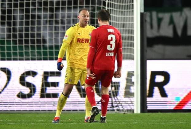 Jubel nach dem Abpfiff Torwart Marvin Schwäbe (1.FC Koeln), Dominique Heintz (1.FC Koeln) 22.11.2024, Fussball 2. Bundesliga, 13. Spieltag, Saison 2024 2025 Preußen Münster - 1. FC Köln 0:1 Muenster Preussenstadion Nordrhein Westfalen Deutschland
