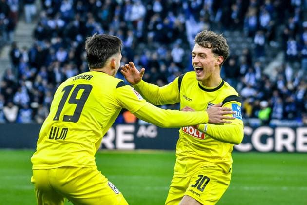 23.11.2024, xlakx, Fussball - 2.Bundesliga, Hertha BSC Berlin - SSV Ulm 1846 emspor, v.l. Jonathan Meier (SSV Ulm 1846 19),Jubel nach dem 2:2 durch Maurice Krattenmacher (SSV Ulm 1846 30) (DFL DFB REGULATIONS PROHIBIT ANY USE OF PHOTOGRAPHS as IMAGE SEQUENCES and or QUASI-VIDEO) Daniel Lakomski Jan Huebner Berlin