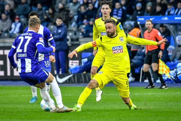 23.11.2024, xlakx, Fussball - 2.Bundesliga, Hertha BSC Berlin - SSV Ulm 1846 emspor, v.l. Michael Cuisance (Hertha BSC 27),Lucas Roeser (SSV Ulm 1846 9),Zweikampf, Duell, Kampf, tackle (DFL DFB REGULATIONS PROHIBIT ANY USE OF PHOTOGRAPHS as IMAGE SEQUENCES and or QUASI-VIDEO) Daniel Lakomski Jan Huebner Berlin